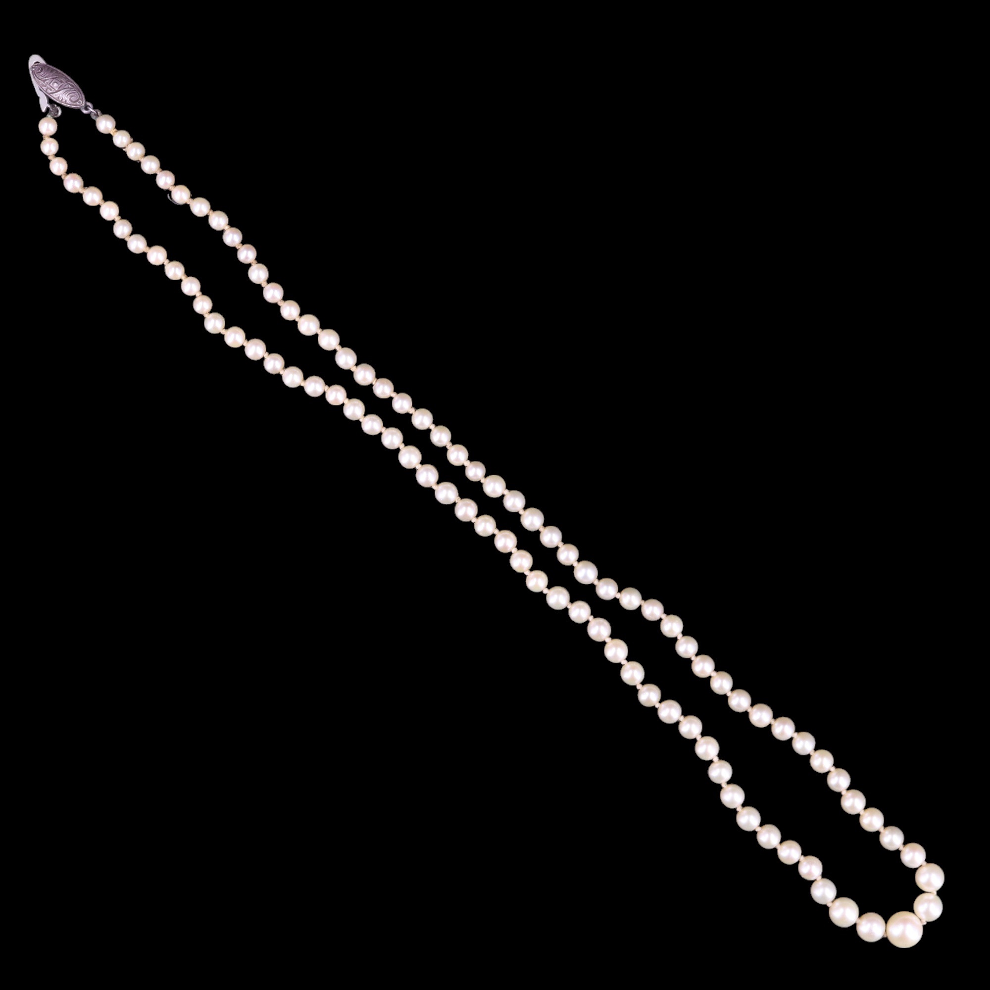 A vintage single-strand necklace of graded pearls, largest 7 mm, 52 cm; together with a pair of 7 mm - Image 3 of 4