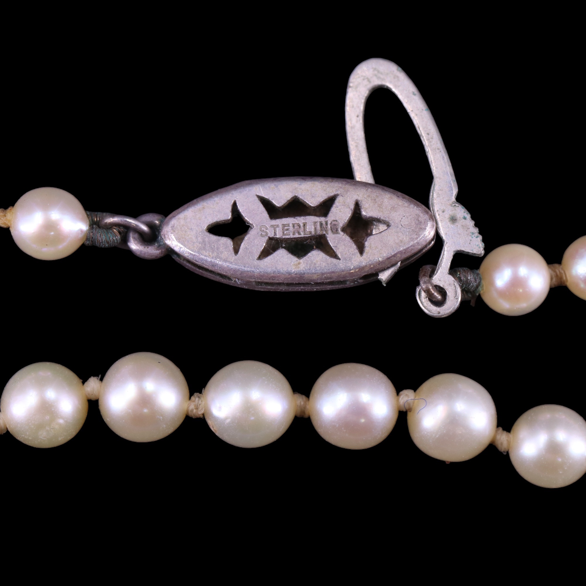 A vintage single-strand necklace of graded pearls, largest 7 mm, 52 cm; together with a pair of 7 mm - Image 4 of 4