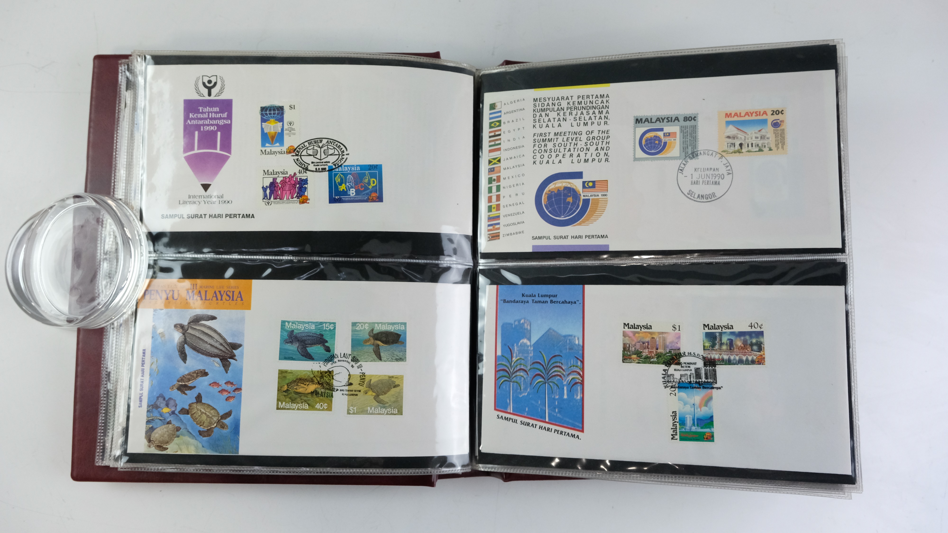A large quantity of albums containing various world stamp covers including royal commemoratives, - Image 135 of 154
