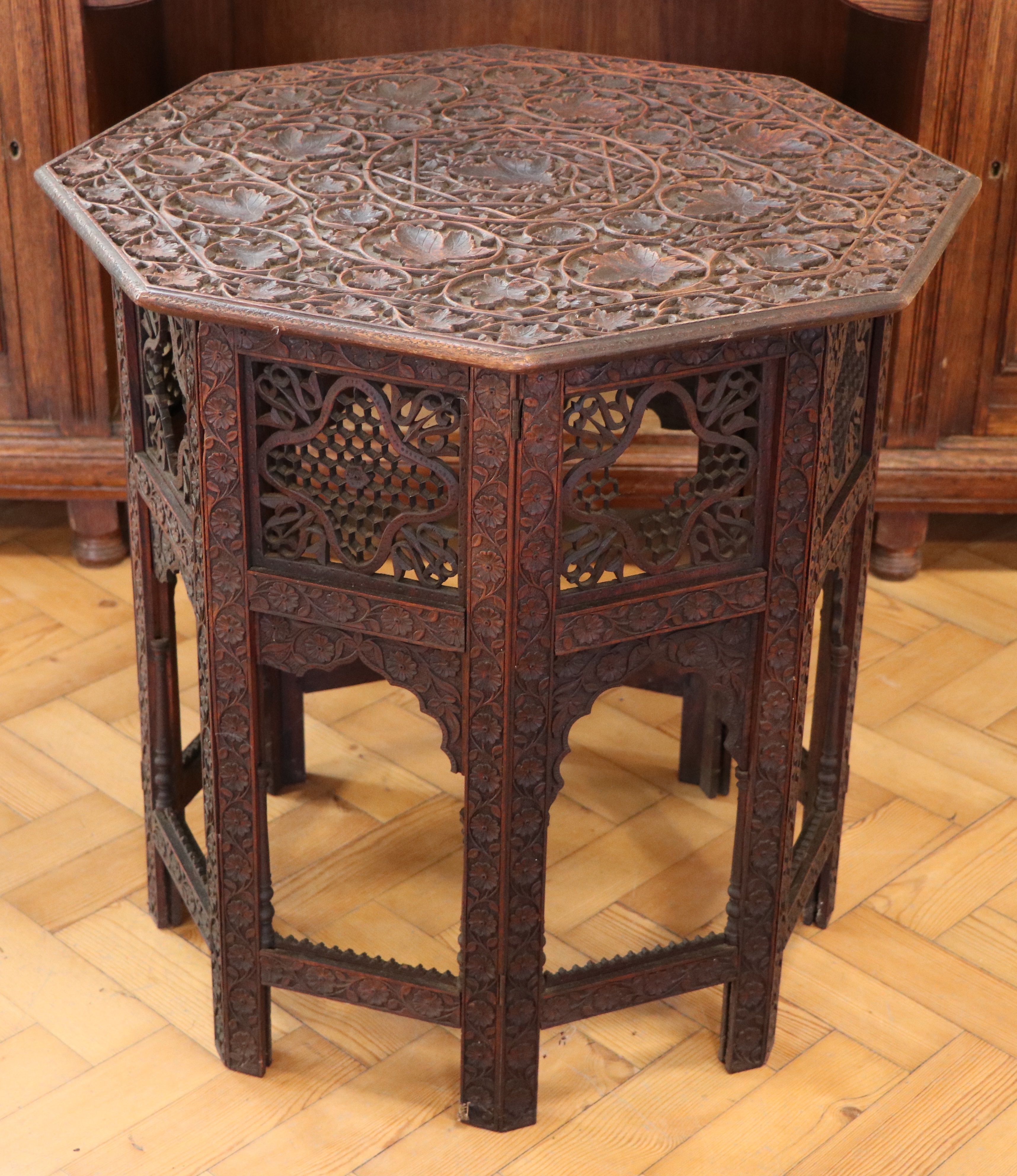 An early 20th Century Indian Hoshiarpur carved wooden folding table, 61 cm x 63 cm high - Image 2 of 7