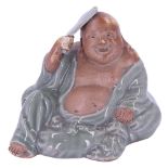 A Chinese Shiwan celadon and semi-bisque glazed ironstone figurine of Budai [ The Laughing