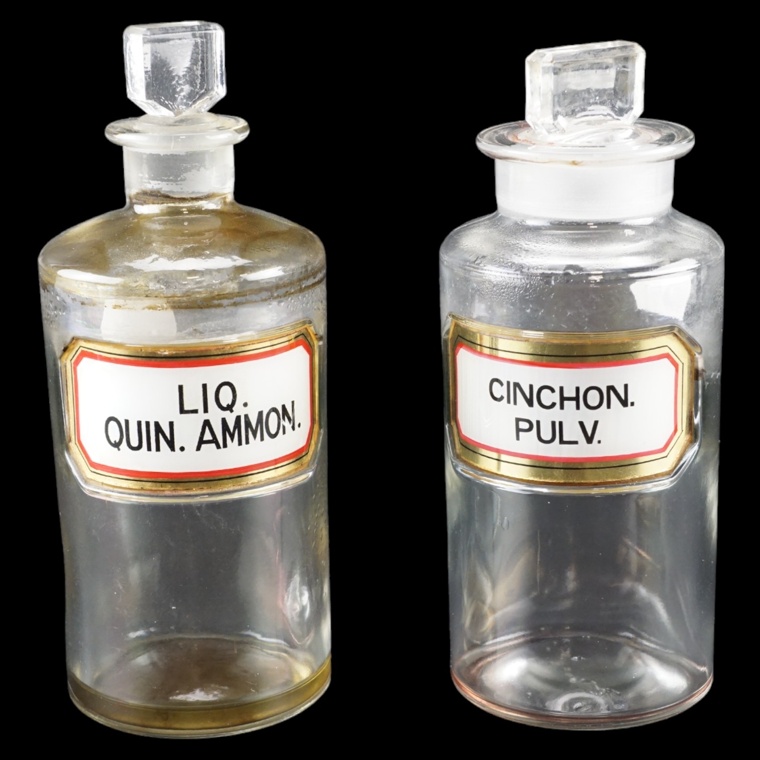 Two late 19th / early 20th Century pharmacists' glass bottles, tallest 20.5 cm