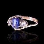 A vintage sapphire and spinel ring, comprising a cushion-cut sapphire of approx 1 ct claw-set