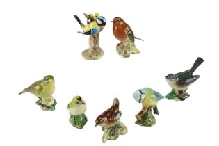A group of Beswick bird figurines together with a Goebel Blue Tit, latter 9 cm