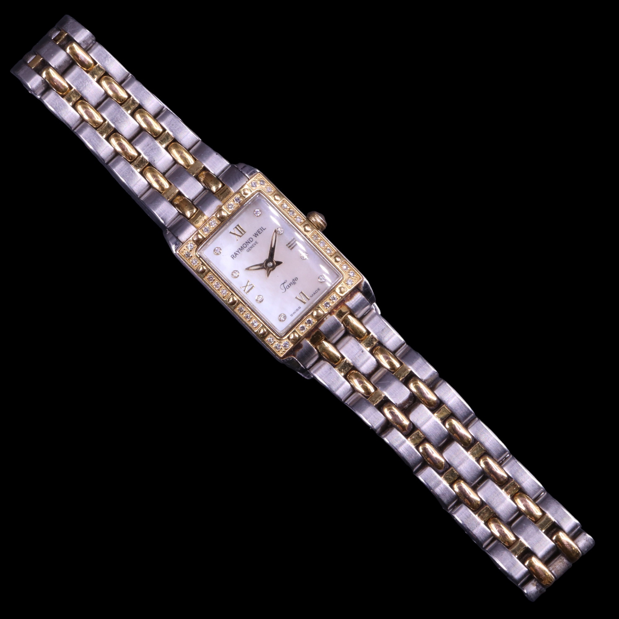 A contemporary Raymond Weil Tango lady's wristwatch, having a quartz movement, rectangular mother- - Image 5 of 11