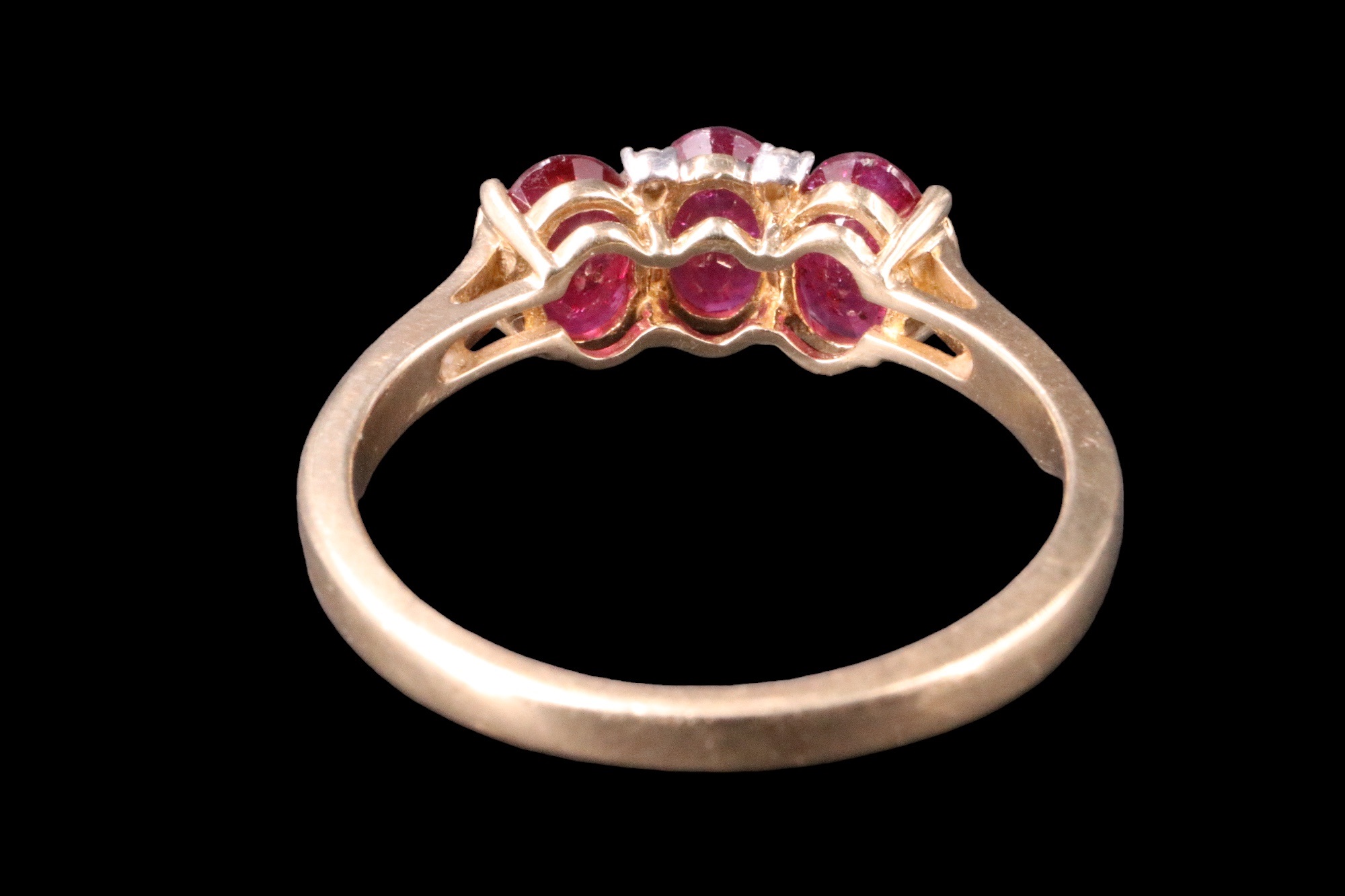 A three-stone natural ruby ring, comprising three oval cut stones each of approx 0.6 ct, bar-and - Image 4 of 9