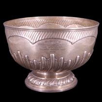 A Victorian silver rose bowl, decorated with gadrooning, inscribed "Presented by John McKie, ESQ.,