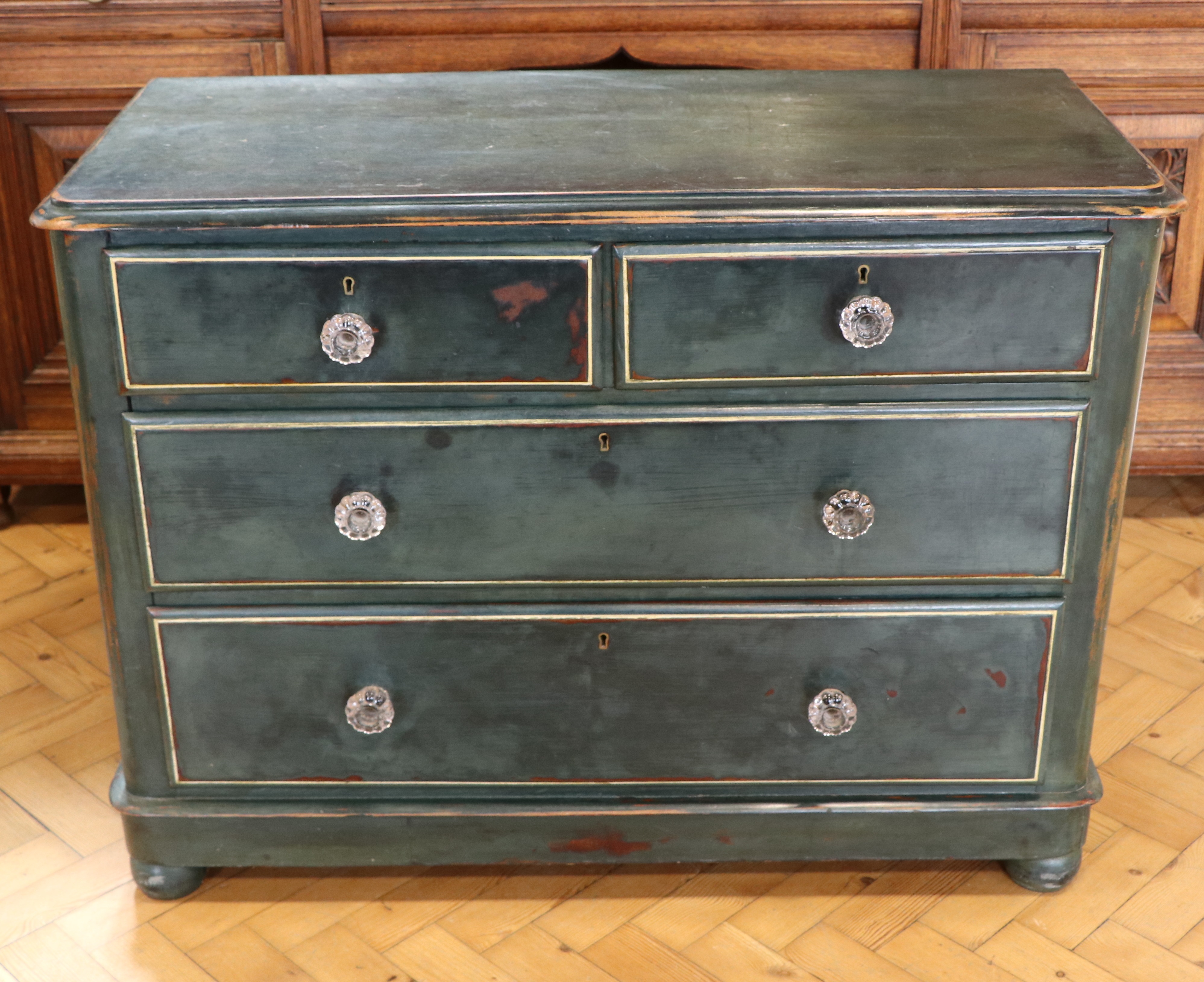 A Victorian painted-pine chest of drawers, having pressed glass lobed knob handles, 52 cm x 104 cm x