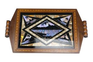 A Brazilian inlaid mahogany butterfly wing tea tray decorated with geometrically reserved silhouette