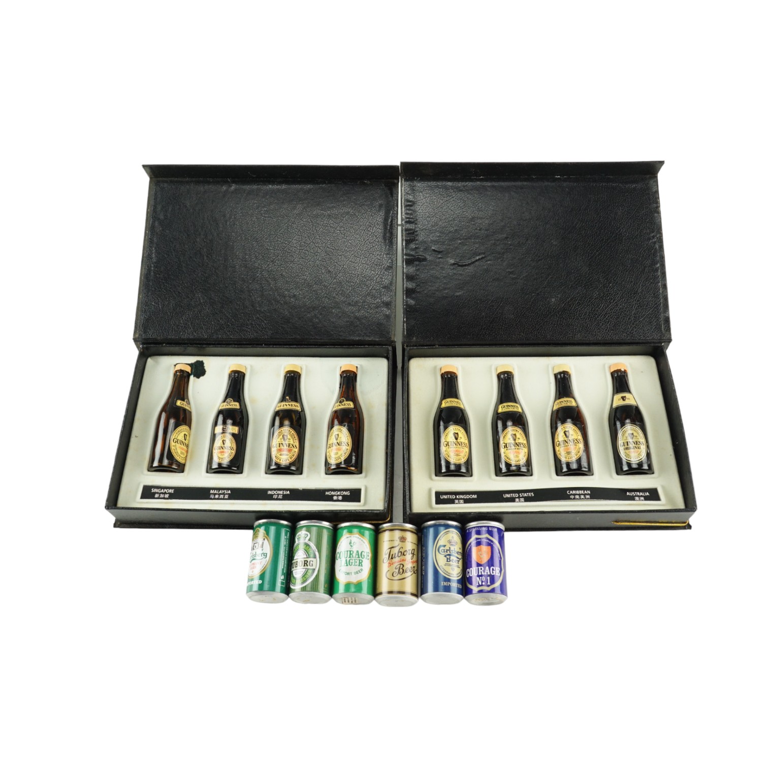 Two cased sets of Guinness Collectibles miniature bottles together with six cans