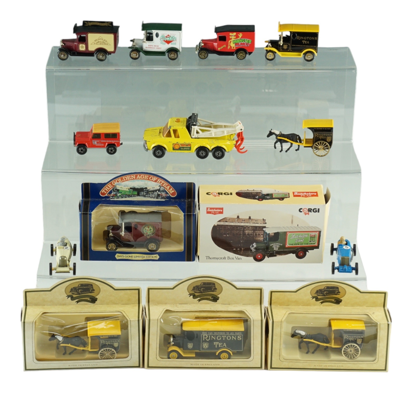 A Corgi diecast Thornycroft box van together with Ringtons vans, etc