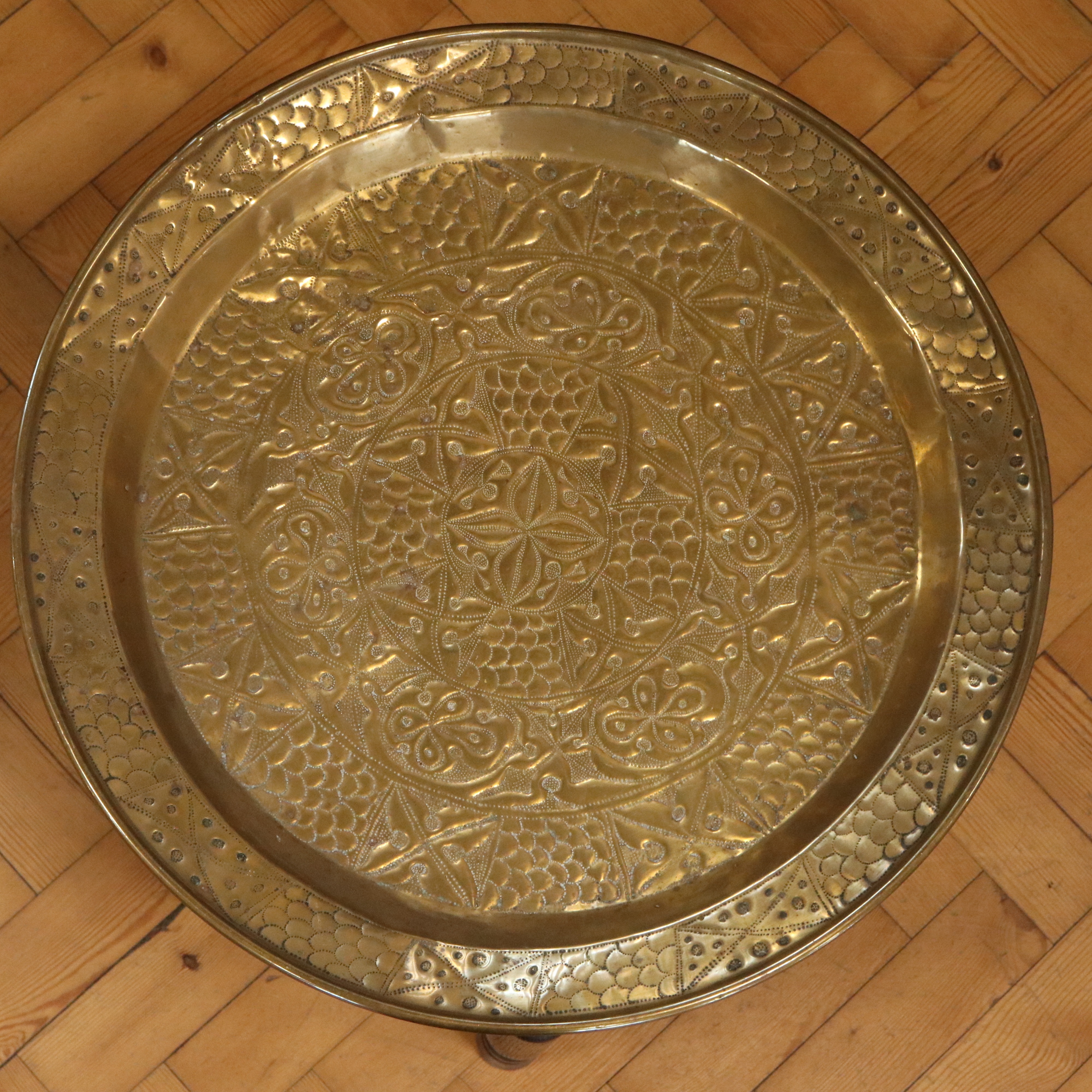 An early-to-mid 20th Century North African brass-topped folding table, 55 cm x 51 cm - Image 3 of 3