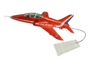 A model RAF BAE Red Arrow Hawk aircraft by Bravo Delta Models Ltd, on a stand and in original box,