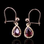 A pair of pendeloque-cut garnet and 9 ct gold ear pendants, the stones each of approx 6 mm x 4 mm,