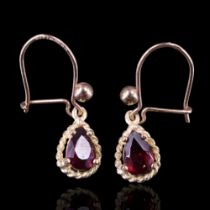 A pair of pendeloque-cut garnet and 9 ct gold ear pendants, the stones each of approx 6 mm x 4 mm,