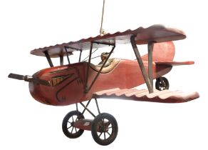 A large-scale carved-wood and steel model biplane and pilot, mid-to-late 20th Century, 74 cm