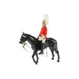 An Action Man Life Guard and horse by Palitoy Ltd, together with a quantity of uniforms etc, 47 cm