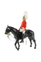 An Action Man Life Guard and horse by Palitoy Ltd, together with a quantity of uniforms etc, 47 cm