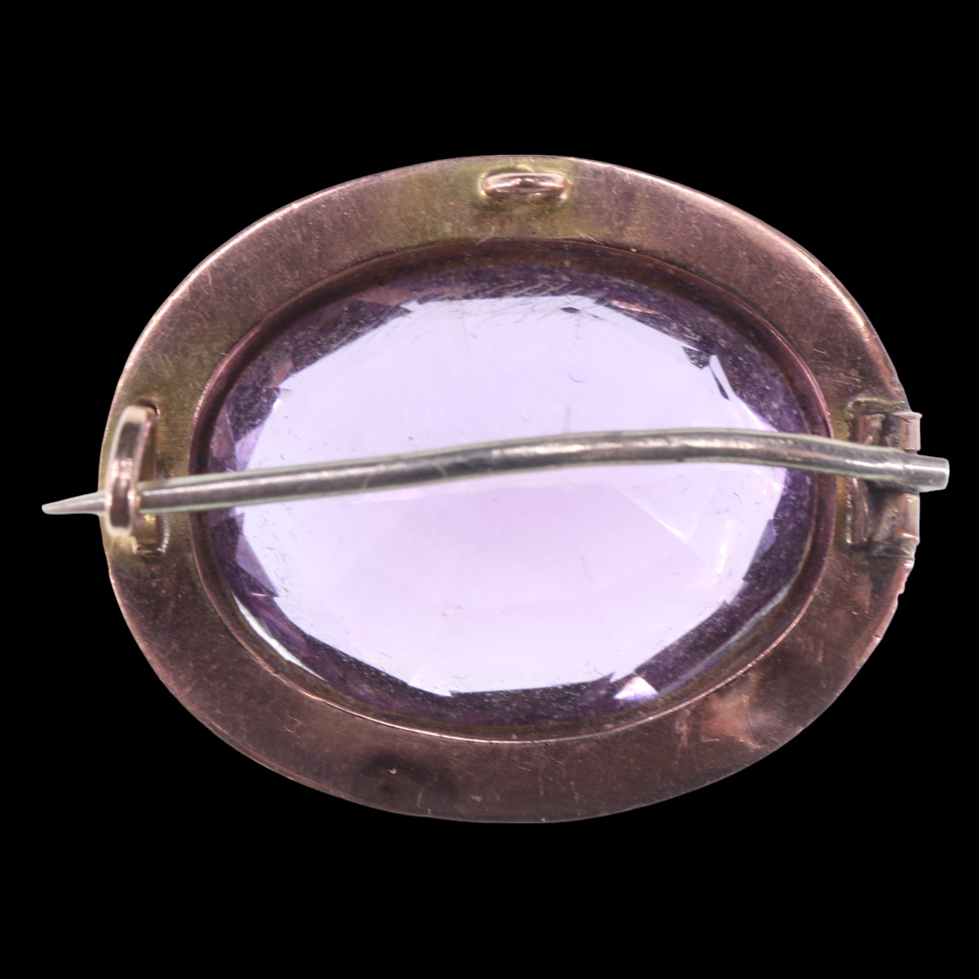 A late 19th / early 20th Century amethyst brooch, the oval cut stone of approx 188 mm x 15 mm - Image 2 of 2