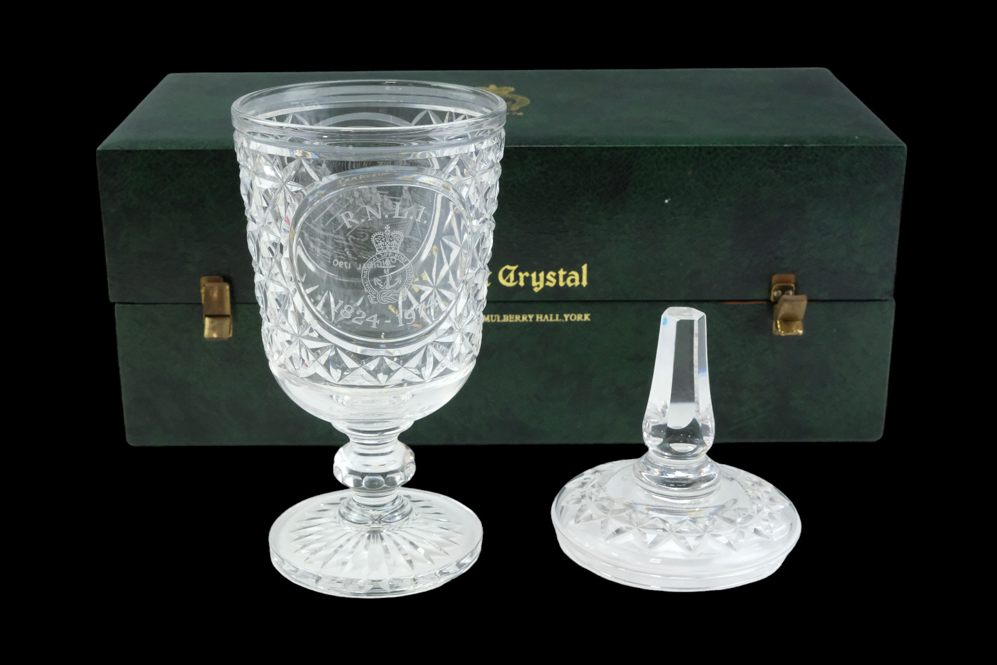 A 1974 Stuart Crystal cut glass covered vase commemorating the Royal National Lifeboat Institution
