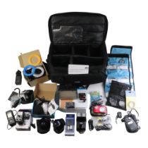 A group of cameras, lenses and accessories including a Japanese 0.45x macro lens and a tele
