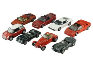 Eight Auto Art diecast model cars including a Millenium Cooper, a Lotus Esprit, etc, 1:18 scale