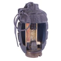 An inert relic Great War No 5 (Mills) grenade in section