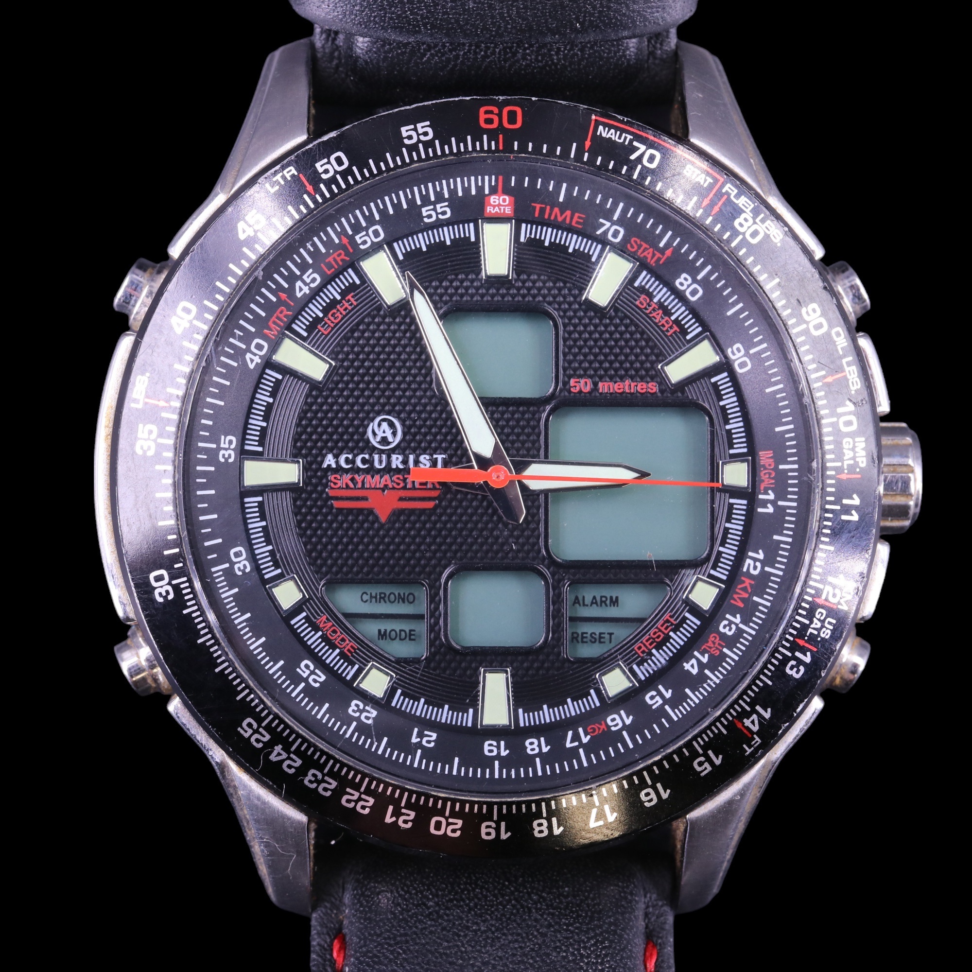 An Accurist Skymaster chronograph wristwatch on a conforming black leather strap, 47 mm excluding