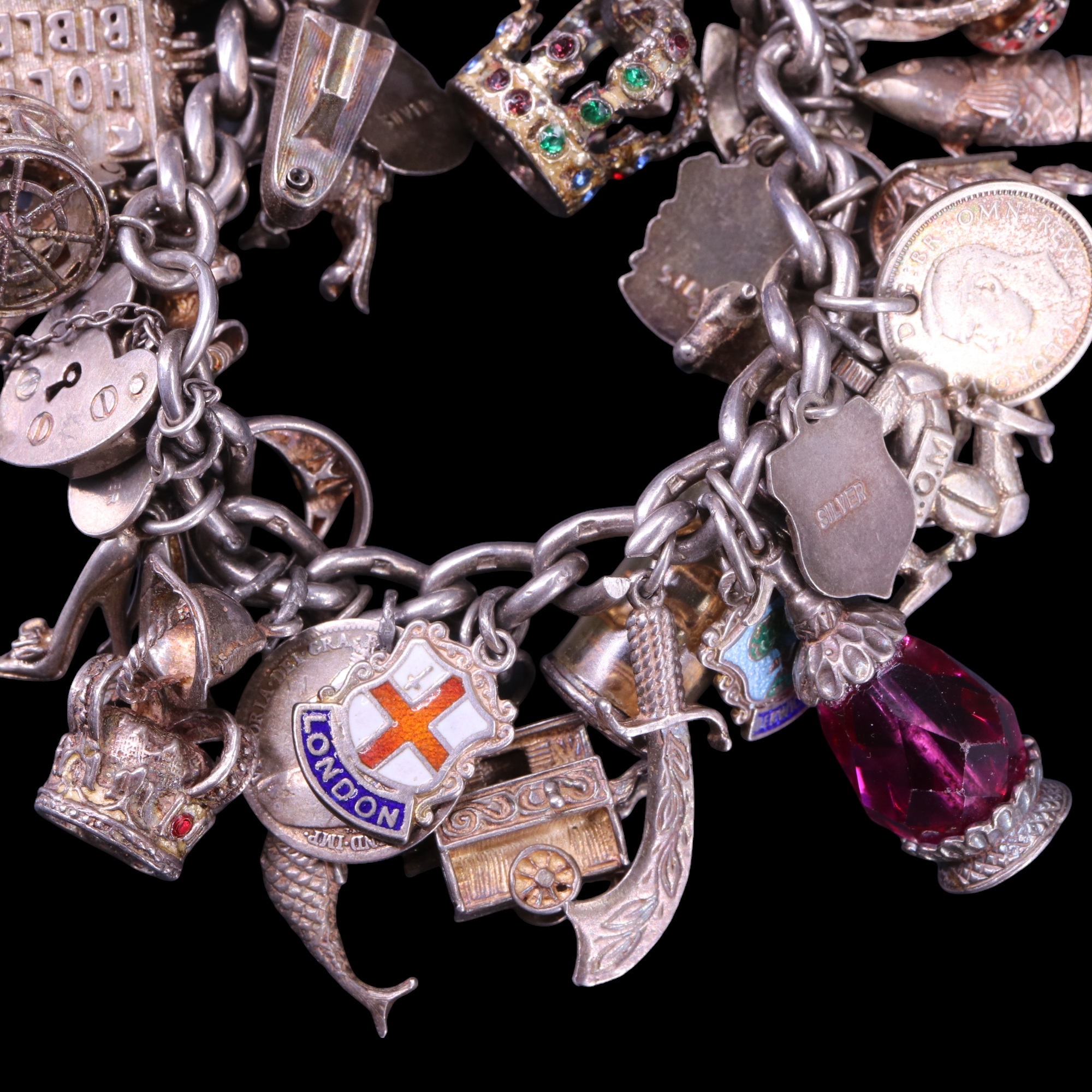 An uncommonly dense vintage silver charm bracelet, 149 g - Image 3 of 4