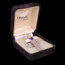 An Ortak white-metal and purple amethyst pendant cross on a curb-link neck chain, pendant 46 mm