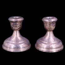A pair of QEII silver candlestands, William Adams Ltd, Birmingham, 1960, 10.5 cm, 770 g (loaded)