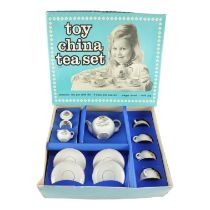 A boxed toy china tea set, teapot 7 cm