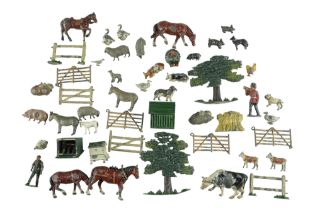 A quantity of early 20th Century diecast farm animals, etc