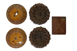 Two late 19th / early 20th Century turned and carved treen bell push patrices together with a pair
