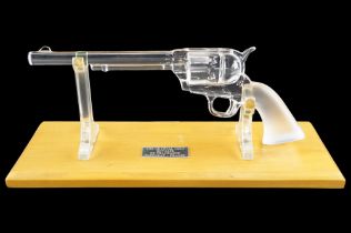 A Royal De Champagne Les Armes glass Colt Peacemaker or similar revolver "The Crystal Colt", on a