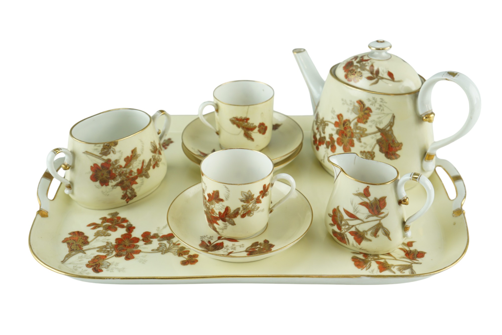 An M Redon of Limoges gilt enriched and floral decorated cabaret tea set and tray, early 20th