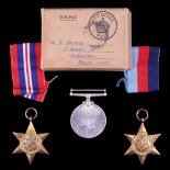 A group of Second World War campaign medals in carton awarded by the Admiralty to Mr R Whiteside