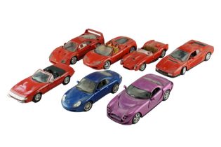 Seven Hot Wheels diecast model cars including a Ferrari F40, a TVR Speed 12, etc, 1:18 scale
