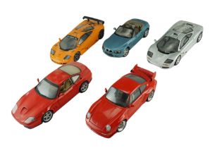 Five N.T diecast model cars including a McLaren F1 GTR, a 1996 Ferrari 550, etc, 1:18 scale