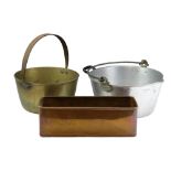 Brass and aluminium jam pans together with a copper planter