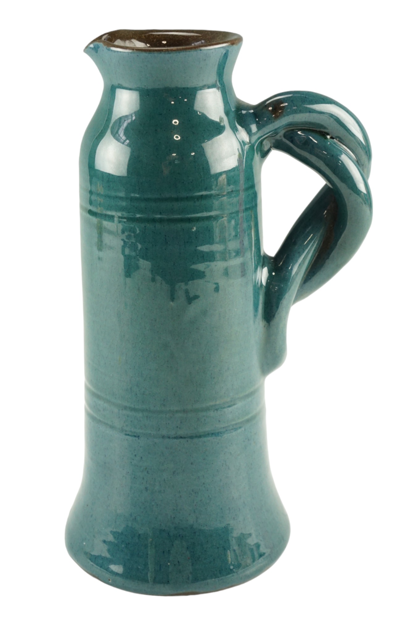 An early 20th Century Schofield of Wetheriggs, Penrith glazed earthenware jug of slender elongated