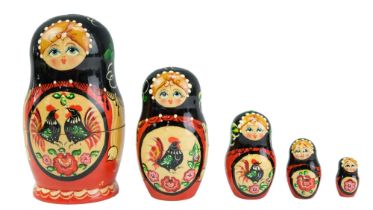 A vintage hand-painted wooden Russian Matryoshka doll, 12.5 cm