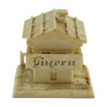 A late 19th Century Swiss novelty combined Stanhope viewer and ink well in the form of a chalet,