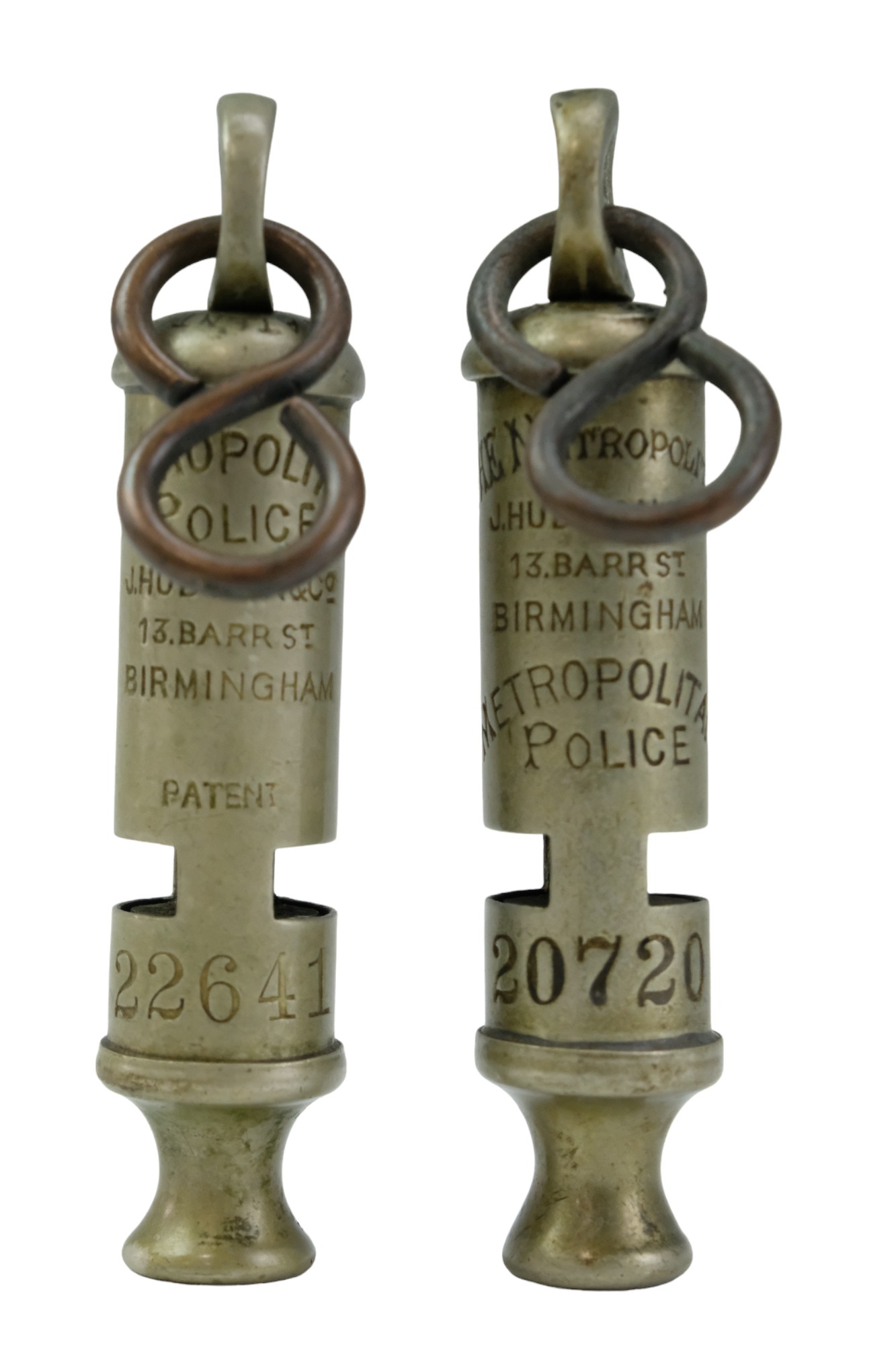 Two early 20th Century Metropolitan Police issue Beaufort whistles by Hudson, each service numbered