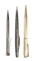 Three vintage propelling pencils comprising two white metal examples (marked "900" and "STERLING