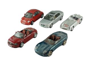 Five Maisto diecast model cars including a Jaguar X-Type (2001), a Jaguar XK 180, etc, 1:18 scale