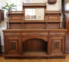 A late / early 20th Century mirror-backed oak sideboard, 204 cm x 63 cm x 196 cm high