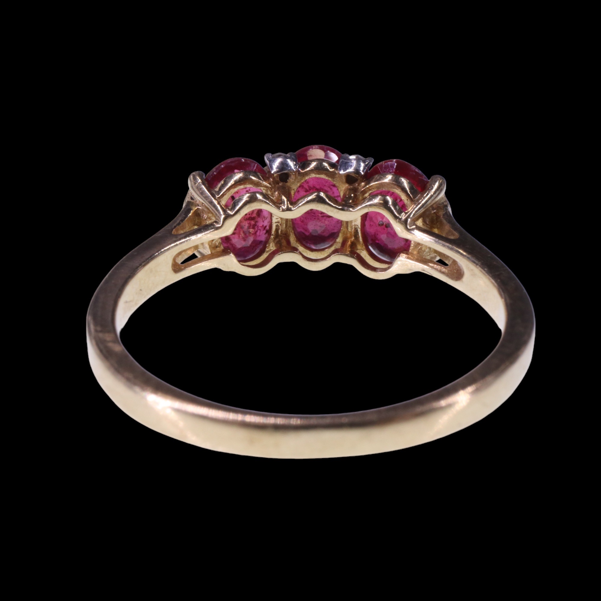 A three-stone natural ruby ring, comprising three oval cut stones each of approx 0.6 ct, bar-and - Image 8 of 9