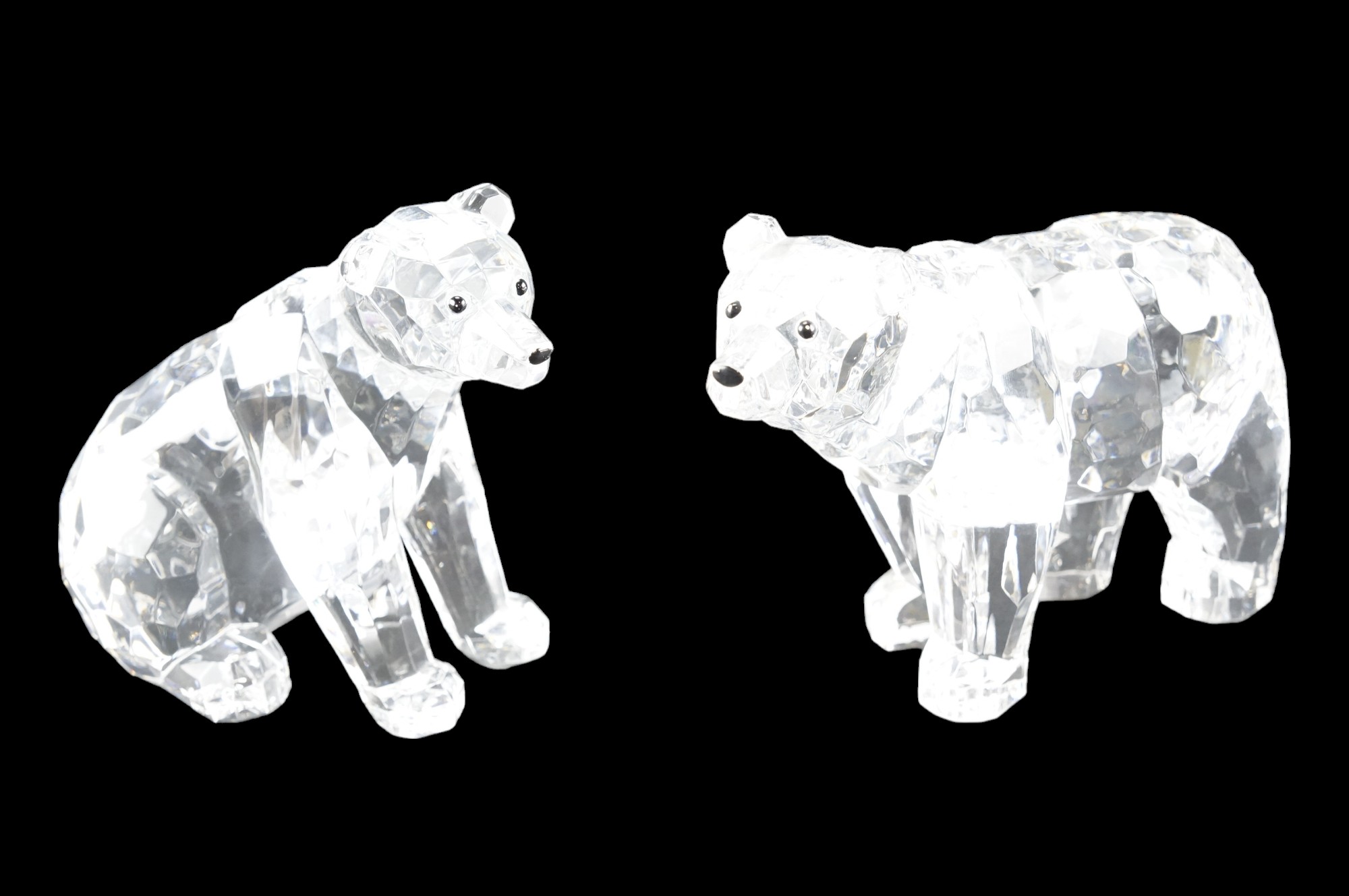 Two Swarovski style resin polar bear shop display figurines, tallest 12 cm