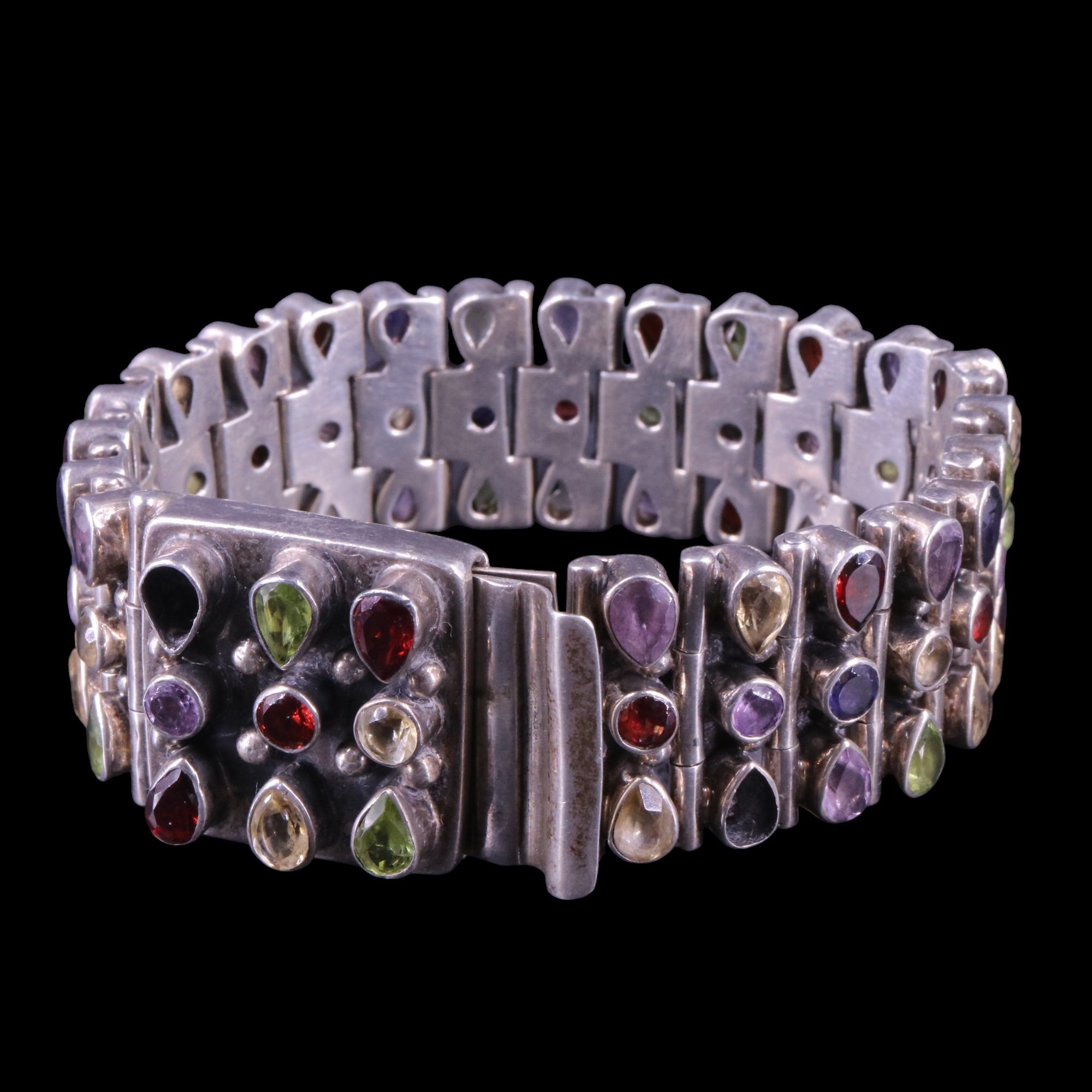 A gem-set silver cuff bracelet, comprising an open series of broad and slender hinged links, each - Image 4 of 5